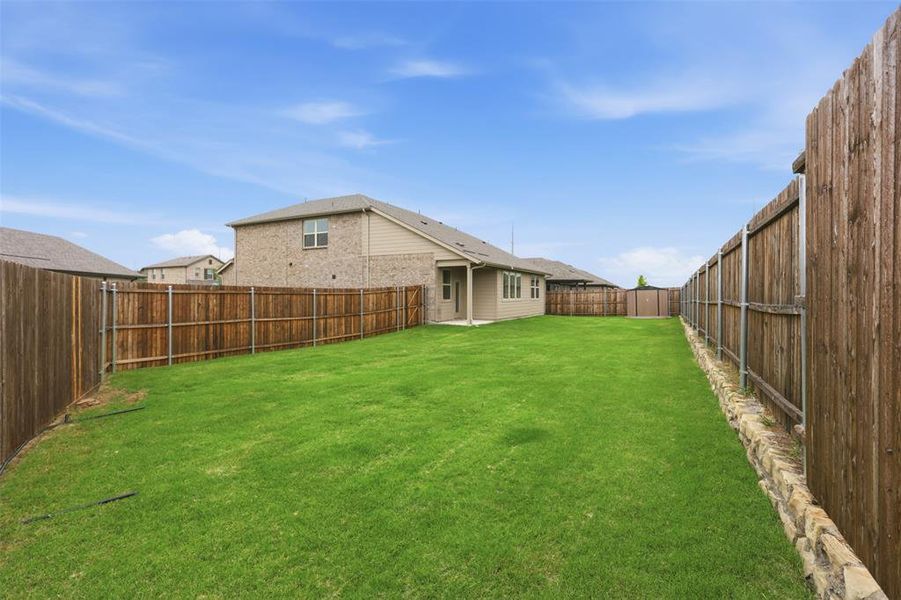 Exterior details and patio area of a home in , Denton (Image 3).