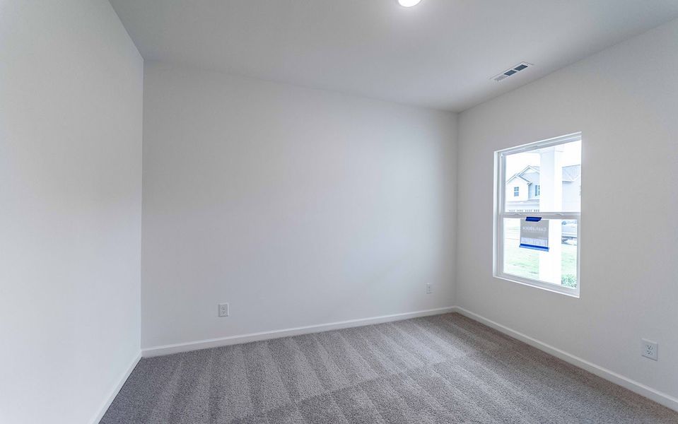 Spacious, unfurnished interior of a new home in Stonehenge, Manchester (Image 6).