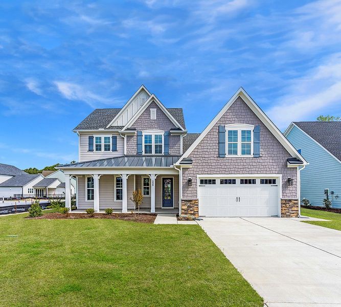 Representative exterior photo of a completed home built from the The Chandler by RobuckHomes in Windwater, Hampstead, NC (Image 24).