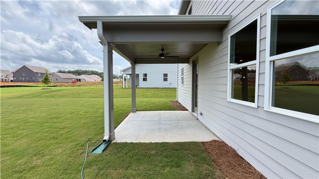 Exterior details and patio area of a home in Wehunt Meadows, Hoschton (Image 4).