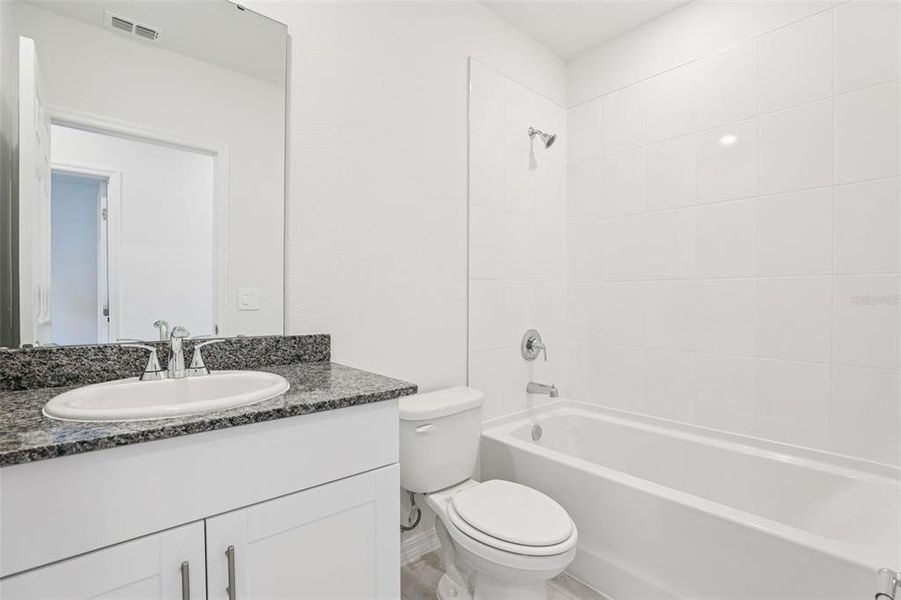 Furnished interior view inside a new home in Lawson Dunes - Signature Series, Haines City (Image 6).