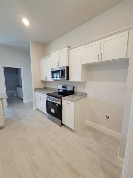 Furnished interior view inside a new home in , Ocala (Image 7).