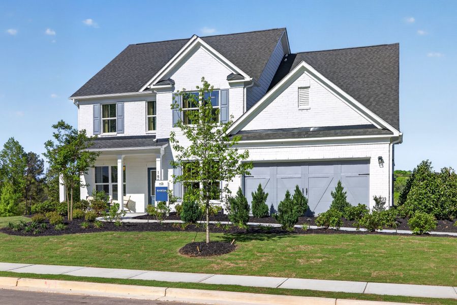 Representative exterior photo of a completed home built from the Riverton by Pulte Homes in Riversprings, Dacula, GA (Image 25).