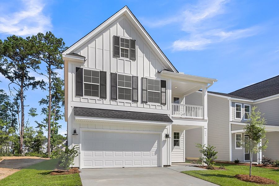 Front exterior of a new home in Pineland Preserve, Summerville, SC, highlighting curb appeal (Image 2). Front exterior of a new home in Pineland Preserve, Summerville, SC, highlighting curb appeal (Image 2).