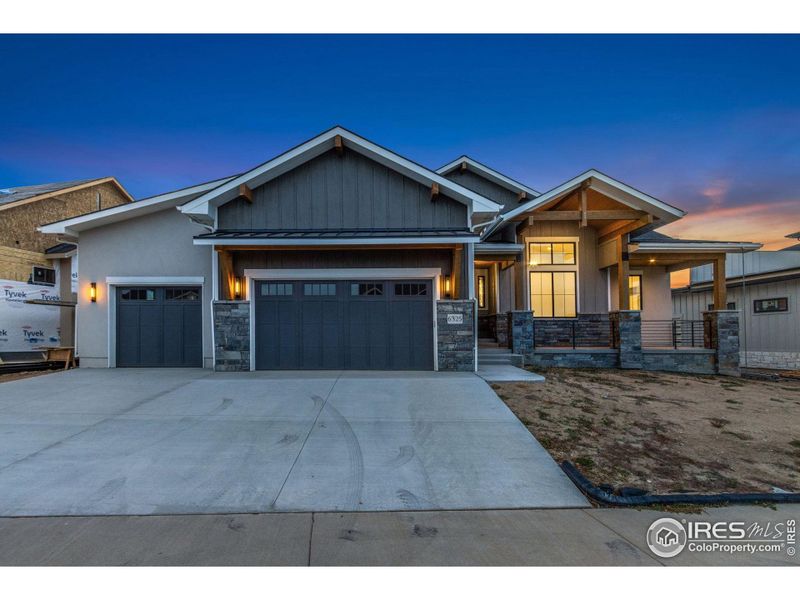 Front exterior of a new home in , Windsor, CO, highlighting curb appeal (Image 25).