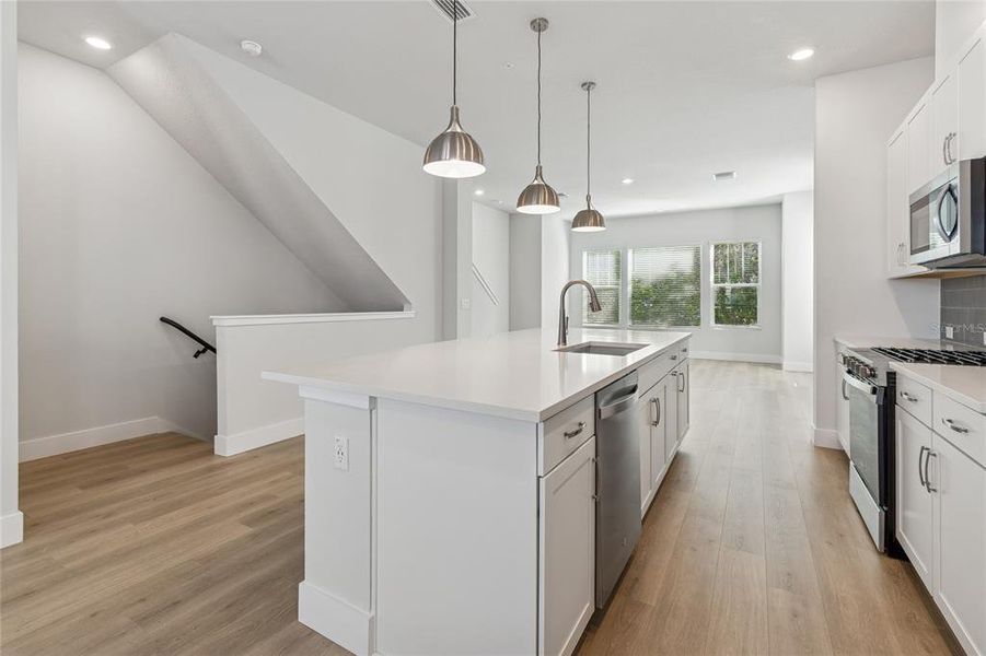 Furnished interior view inside a new home in Apex at Seminole Heights, Tampa (Image 13). Furnished interior view inside a new home in Apex at Seminole Heights, Tampa (Image 13).