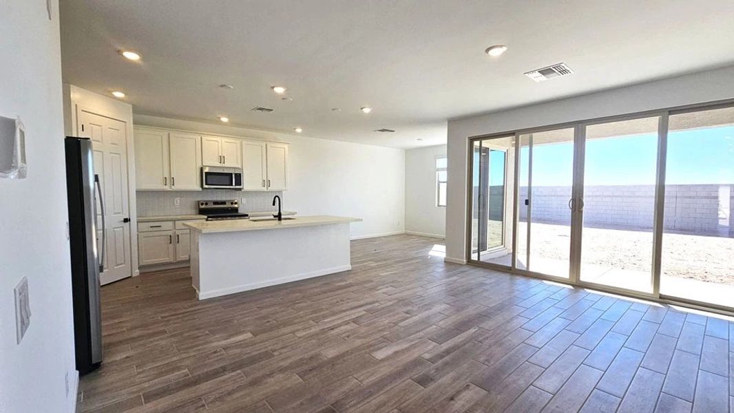 Great room, kitchen and dining