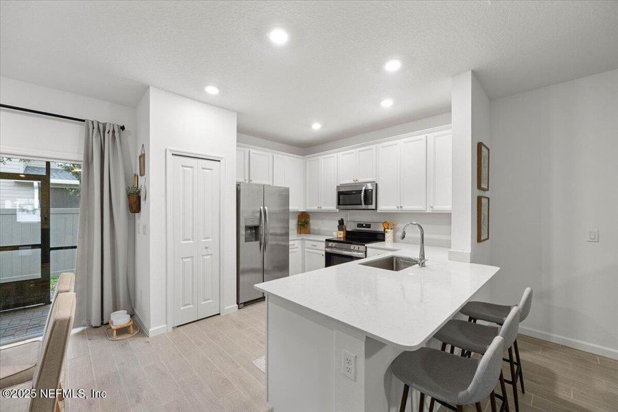 Furnished interior view inside a new home in Shearwater: Affordable Luxury Townhomes, St. Augustine (Image 16).