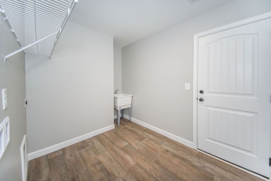 Representative unfurnished interior of a home built from the Archer by Enchanted Homes in Lonesome Dove, San Antonio (Image 30).