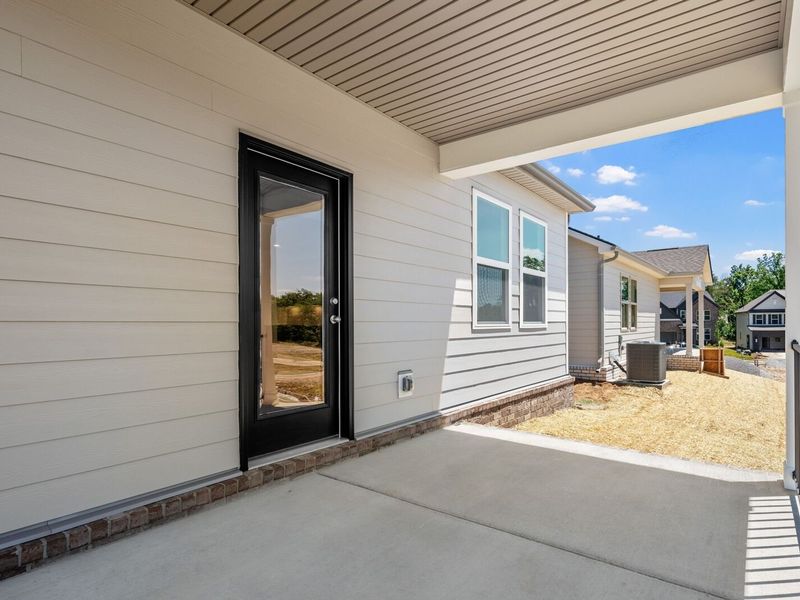 Exterior details and patio area of a home in Woods Crossing, Gallatin (Image 26).