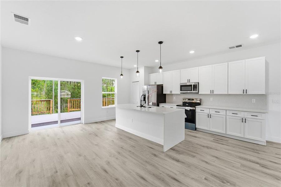 Furnished interior view inside a new home in , Ocala (Image 9).