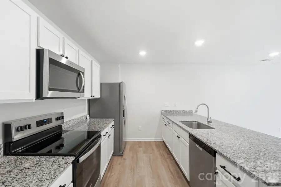 Furnished interior view inside a new home in Trivium, Newton (Image 7).