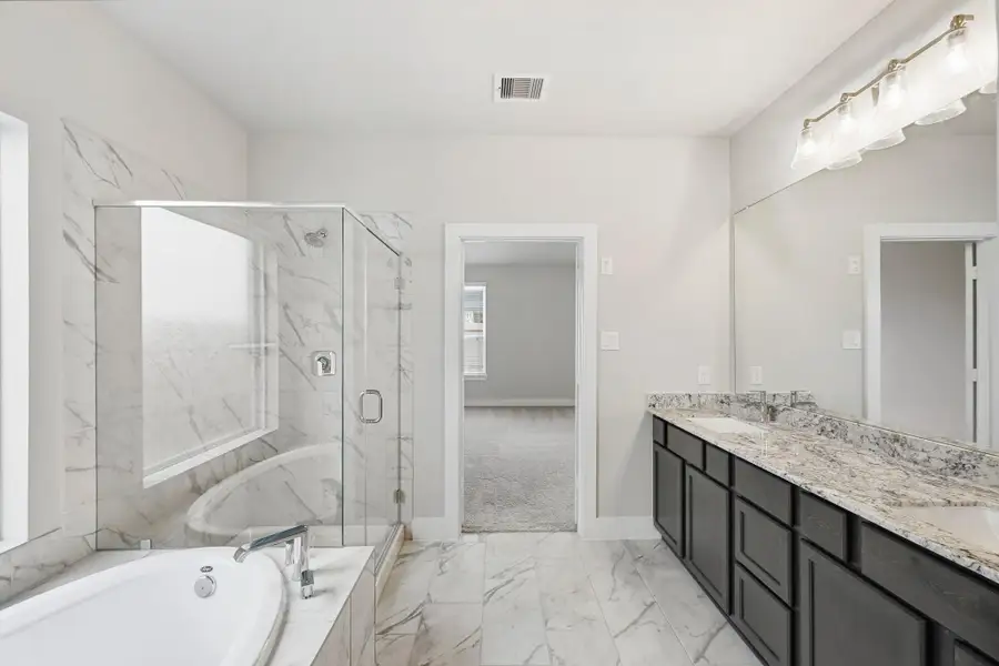 Furnished interior view inside a new home in Barton Creek Ranch, Conroe (Image 8).