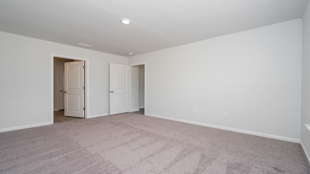 Representative unfurnished interior of a home built from the CALI by D.R. Horton in Jordanville Farms, Galivants Ferry (Image 34).