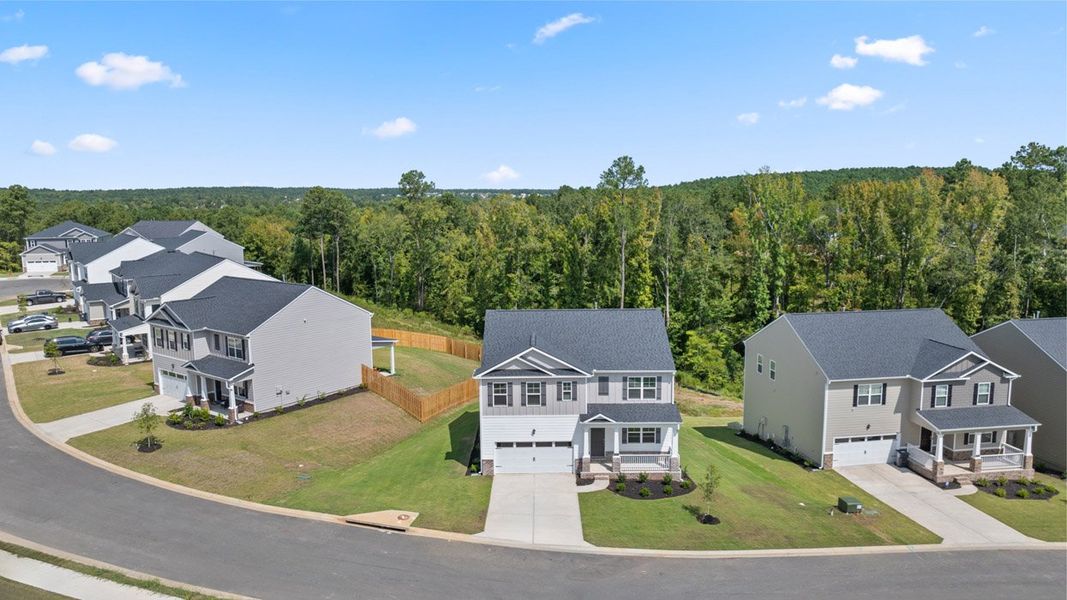 Front exterior of a new home in Southwind Village, Evans, GA, highlighting curb appeal (Image 25). Front exterior of a new home in Southwind Village, Evans, GA, highlighting curb appeal (Image 25).