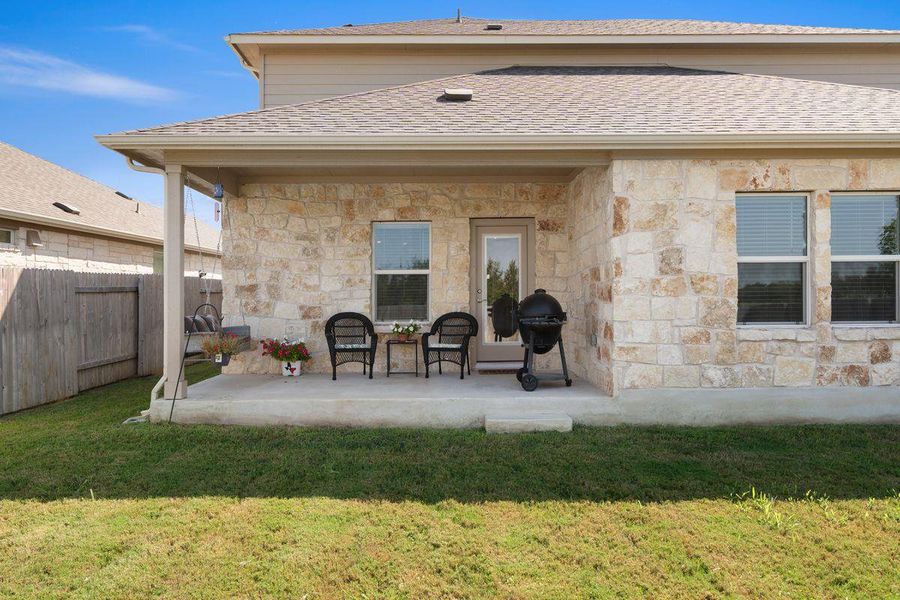 Enjoy the covered back patio, perfect for relaxing outdoors or entertaining with family and friends. Enjoy the covered back patio, perfect for relaxing outdoors or entertaining with family and friends.