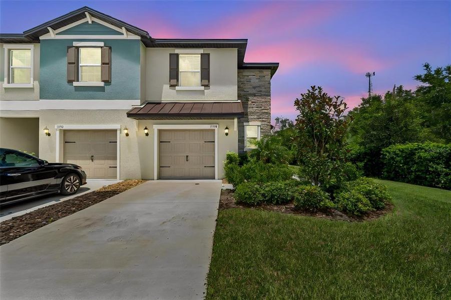 Front exterior of a new home in , Land O' Lakes, FL, highlighting curb appeal (Image 28).