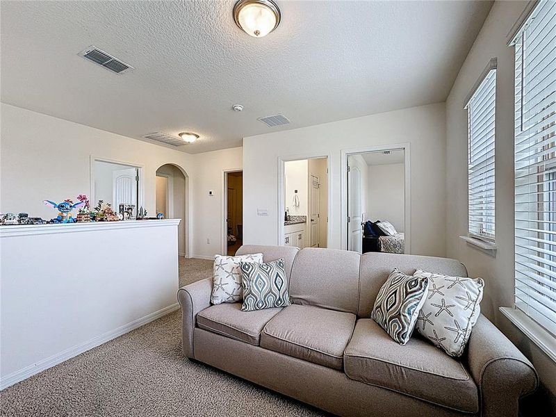 Furnished interior view inside a new home in , Winter Garden (Image 10).