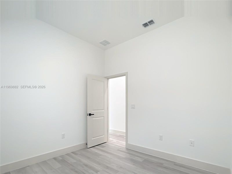 Spacious, unfurnished interior of a new home in , Port Charlotte (Image 33).
