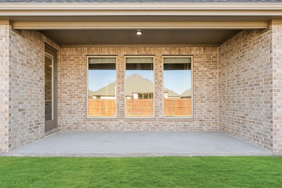 Exterior details and patio area of a home in Timberbrook, Justin (Image 3).