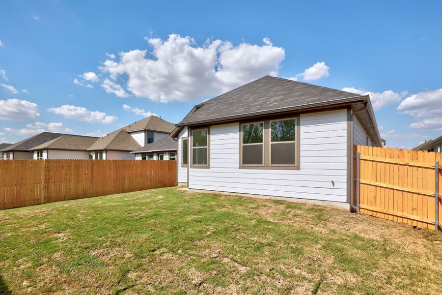 Exterior details and patio area of a home in Trinity Ranch, Elgin (Image 21).