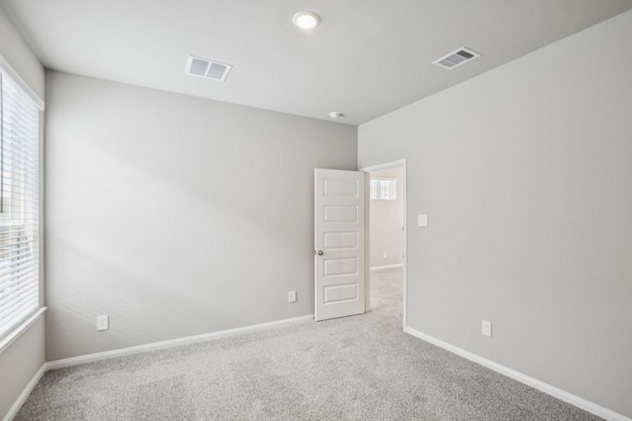 Spacious, unfurnished interior of a new home in Kemah Crossing - Luxe Series, Kemah (Image 25). Spacious, unfurnished interior of a new home in Kemah Crossing - Luxe Series, Kemah (Image 25).