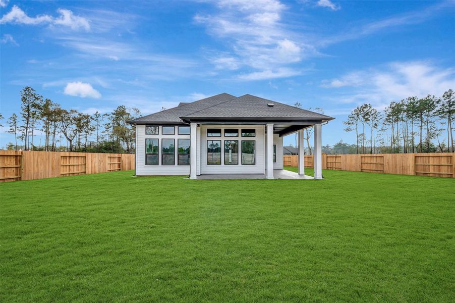 Exterior details and patio area of a home in ARTAVIA 50' Homesites, Conroe (Image 27).