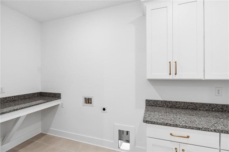 Furnished interior view inside a new home in Maple Grove at Towne Lake, Woodstock (Image 8).