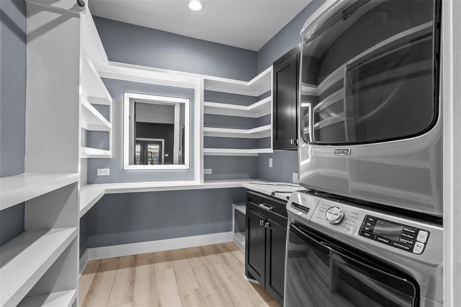 Laundry room in primary bedroom