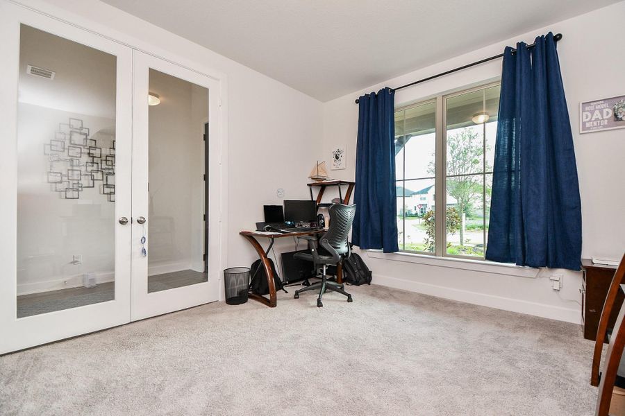 This front room, right off the main hallway, welcomes any activity! Traditional use of such a room includes a private home office/study.The huge double window brings amazing natural light into the comfortably carpeted space, with tons of wall and floor space for your desired furnishings. This front room, right off the main hallway, welcomes any activity! Traditional use of such a room includes a private home office/study.The huge double window brings amazing natural light into the comfortably carpeted space, with tons of wall and floor space for your desired furnishings.
