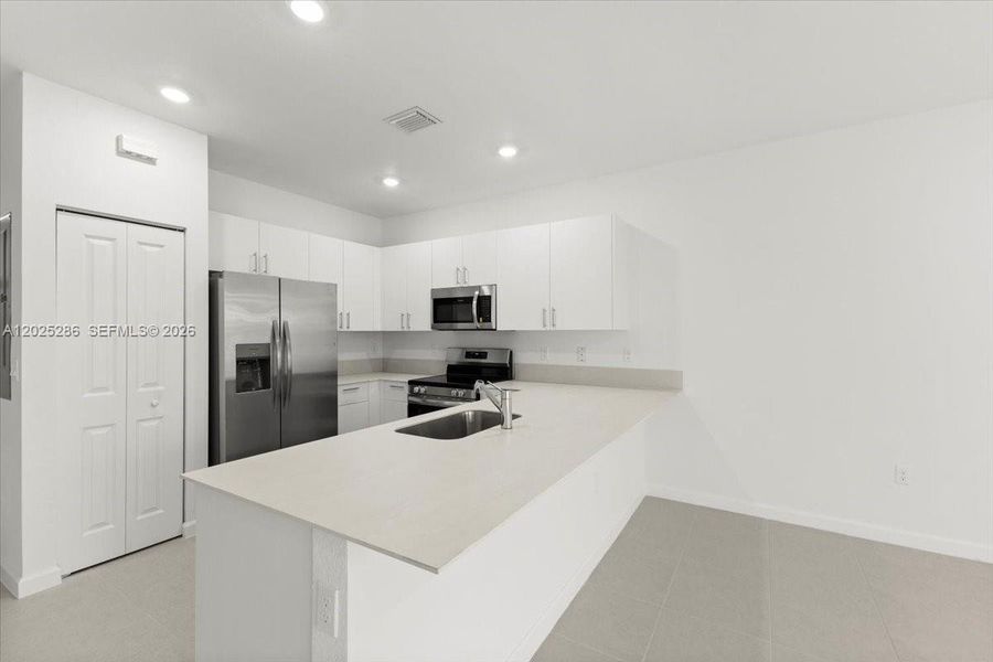 Furnished interior view inside a new home in , Miami (Image 12). Furnished interior view inside a new home in , Miami (Image 12).