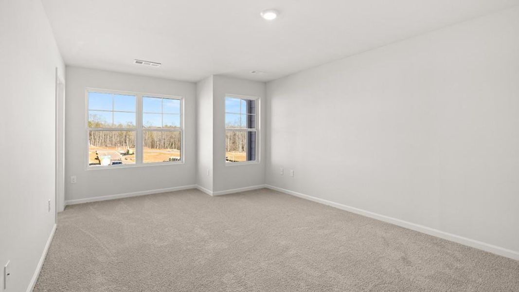 Spacious, unfurnished interior of a new home in Waypoint, Flowery Branch (Image 23).