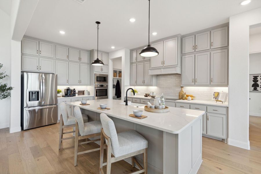 Kitchen | Concept 3441 at Hidden Creek Estates in Van Alstyne, TX by Landsea Homes