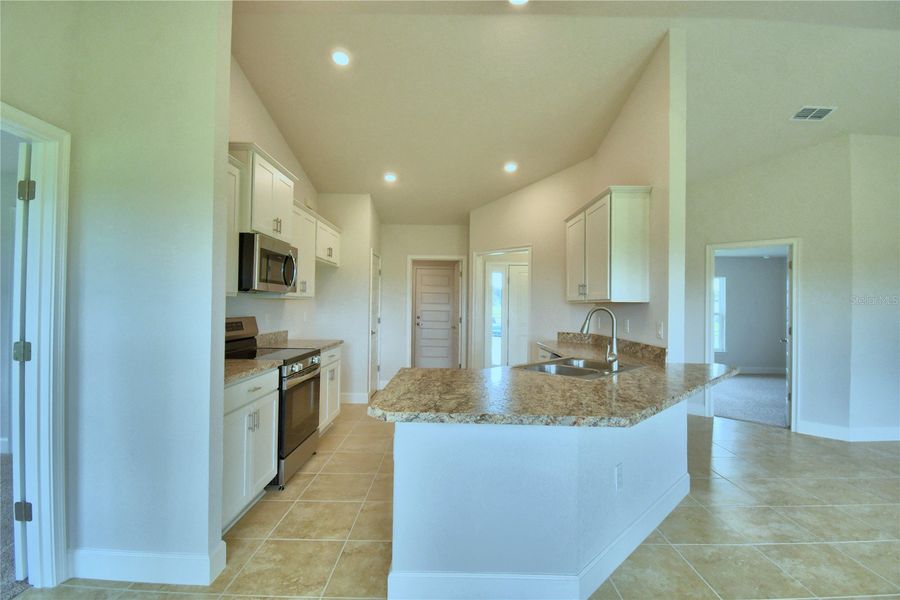 Furnished interior view inside a new home in Cadence Crossing, Auburndale (Image 8).