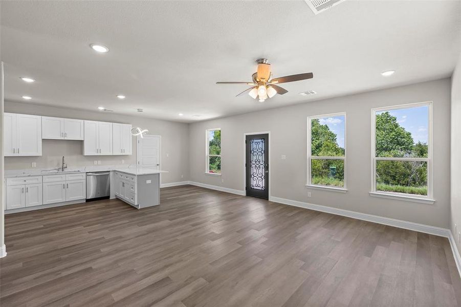 View of entry way leading to living room and kitchen