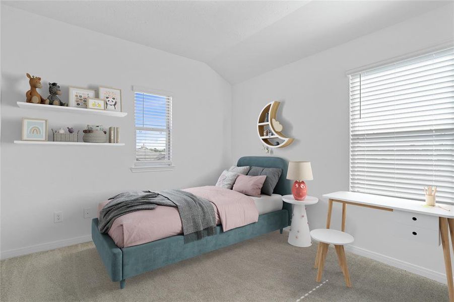 Secondary bedroom features plush carpet, custom paint, ample closet space and a large window with privacy blinds.