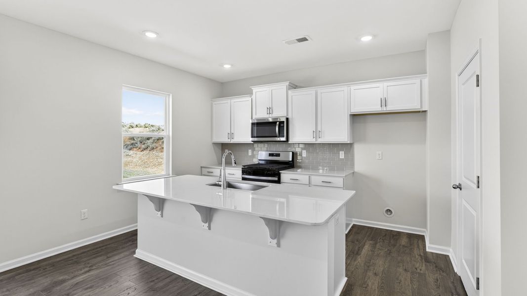 Furnished interior view inside a new home in Hunters Ridge, Woodruff (Image 7).