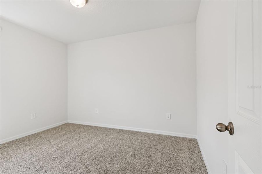 Spacious, unfurnished interior of a new home in Bradbury Creek - Signature Series, Haines City (Image 26).