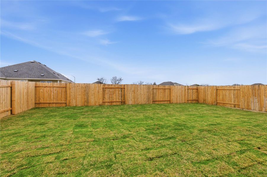 Exterior details and patio area of a home in Infinity Square, Kyle (Image 4).