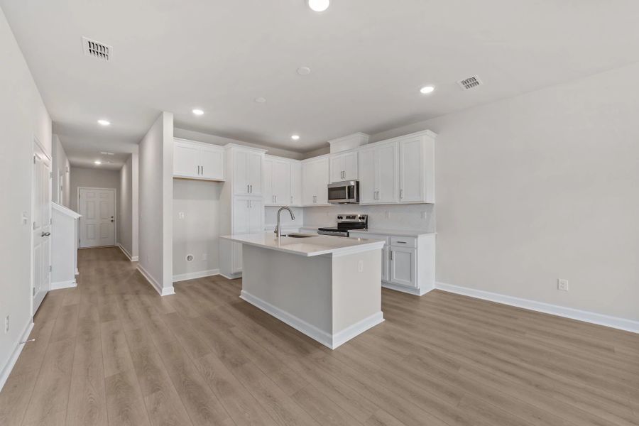 Furnished interior view inside a new home in Blue Heron Retreat, Little River (Image 9).