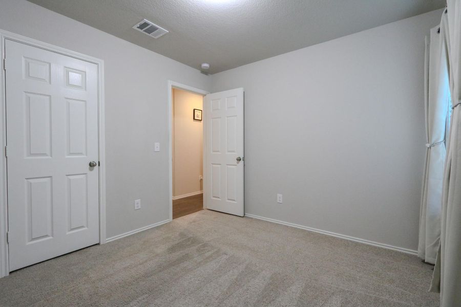 Spacious, unfurnished interior of a new home in Magnolia Ridge: Watermill Collection, Magnolia (Image 22). Spacious, unfurnished interior of a new home in Magnolia Ridge: Watermill Collection, Magnolia (Image 22).