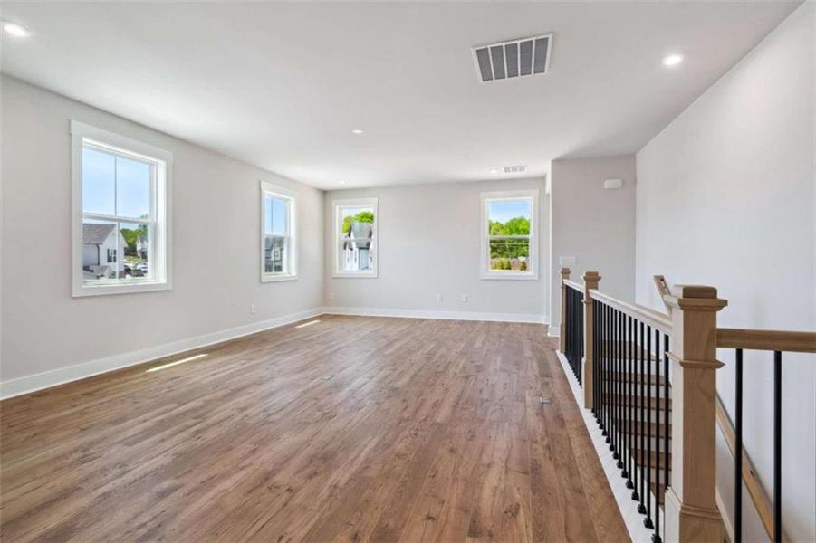 Spacious, unfurnished interior of a new home in The Paddocks at Doc Hughes, Buford (Image 28). Spacious, unfurnished interior of a new home in The Paddocks at Doc Hughes, Buford (Image 28).