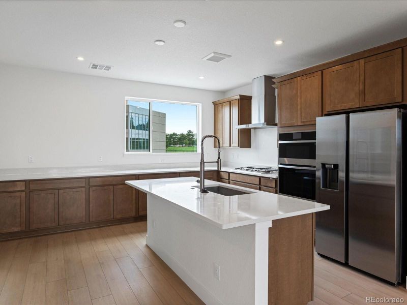 Furnished interior view inside a new home in Ascent at Inverness, Englewood (Image 4).