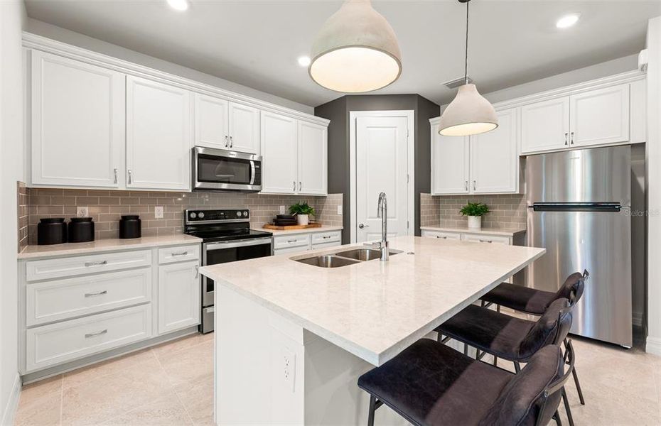 Furnished interior view inside a new home in The Strand at Cedar Grove, North Port (Image 19).