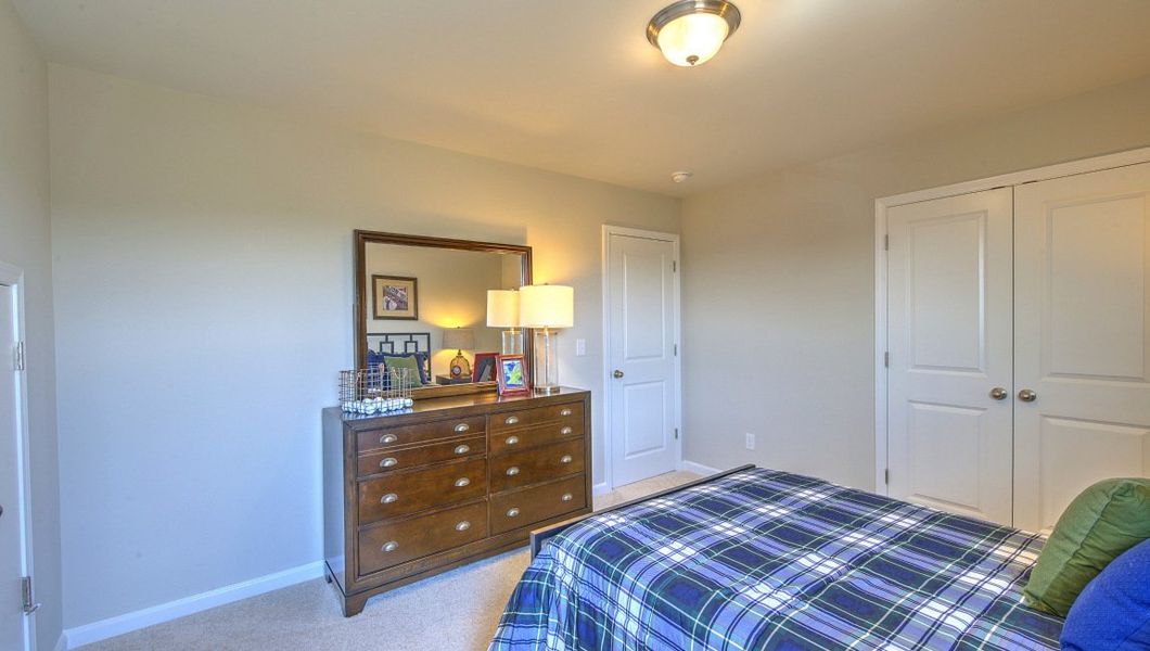Furnished interior view inside a new home in Reserve at Tap Root Farms, Fletcher (Image 41).