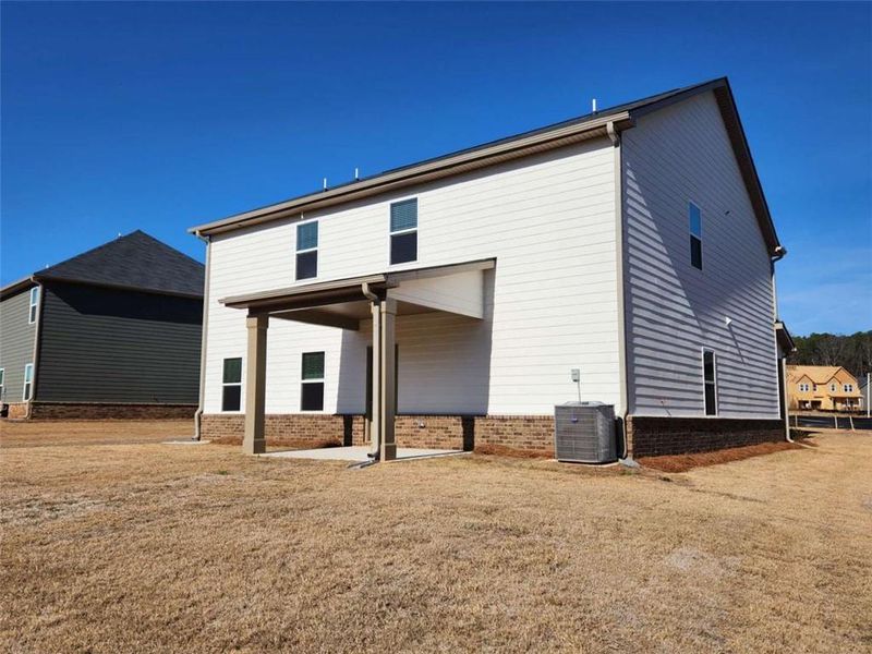 Exterior details and patio area of a home in Southern Hills, McDonough (Image 21).