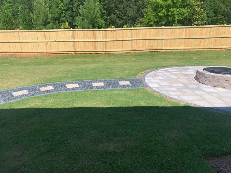 Exterior details and patio area of a home in Overland, Locust Grove (Image 4). Exterior details and patio area of a home in Overland, Locust Grove (Image 4).