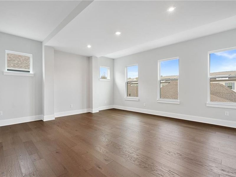 Spacious, unfurnished interior of a new home in The Village at Towne Lake, Woodstock (Image 74).