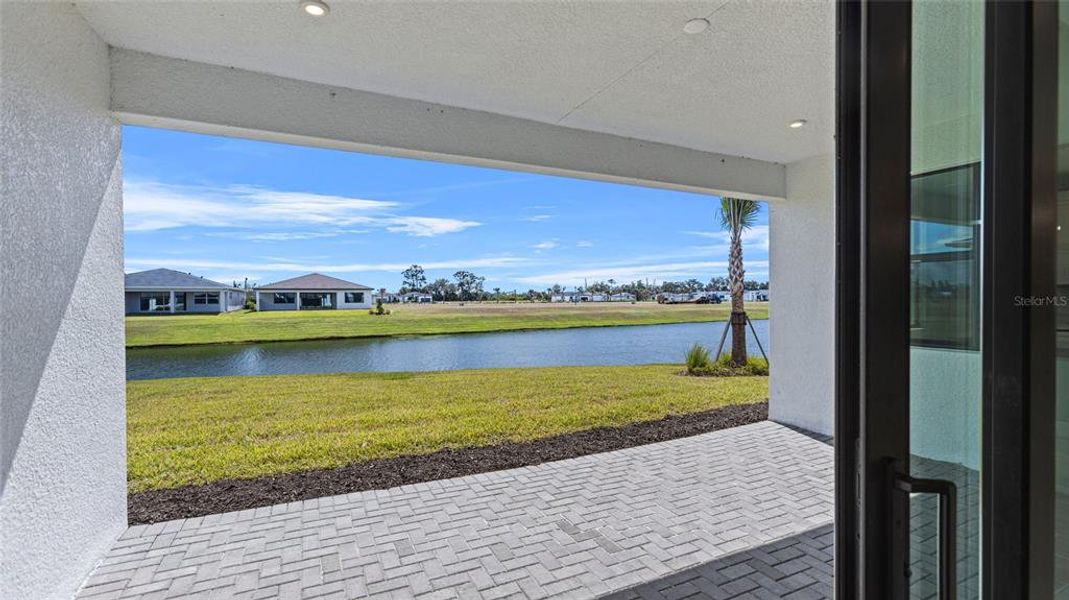 Exterior details and patio area of a home in Woodland Preserve, Parrish (Image 4).