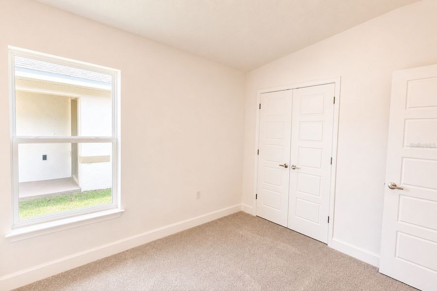 Spacious, unfurnished interior of a new home in Harmony Central, St. Cloud (Image 15).
